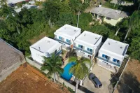 A modern 2-bedroom villa with pool and lounge area
