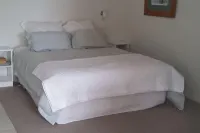 Wainui Absolute Beachfront Studio Unit Hotell i Wainui