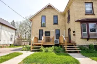 The Otis 𓅬 on Victoria Park | 2 Bed 1 Bath | Main Floor Suite Hotels near Christie Digital Systems Inc