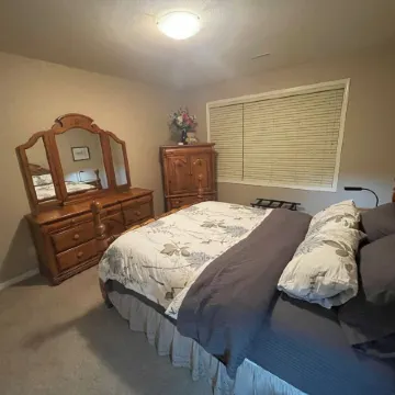 Mountain view, beautiful walk out suite overlooking a park and creek. 3bedrooms.