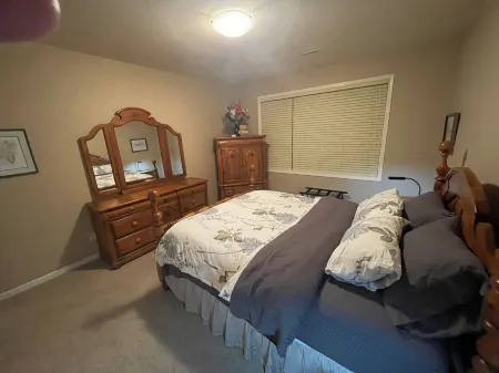 Mountain view, beautiful walk out suite overlooking a park and creek. 3bedrooms.