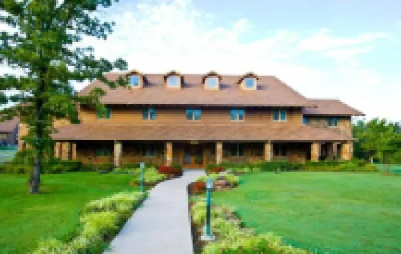 Postoak Lodge and Retreat Hotel a 