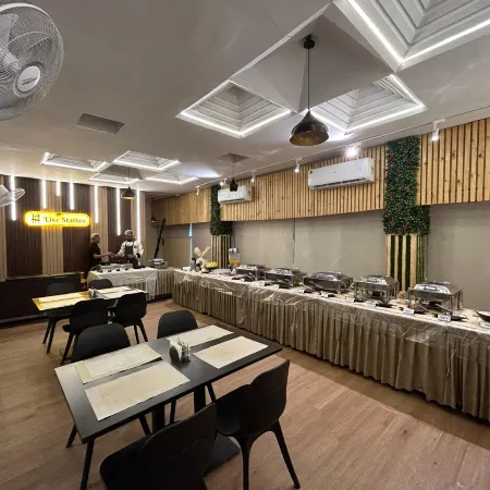 New Hotel Suhail Отели рядом с достопримечательностью «Район Нампалли»