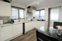 Beautiful 3 Bedroom Home With Parking and Fitness Equipment