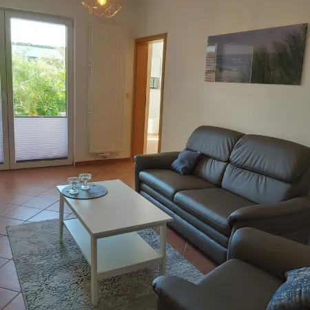Modern apartment with south-facing terrace near the center.