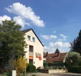 Auracher Hof Отели рядом с достопримечательностью «Stammhaus Dassler»
