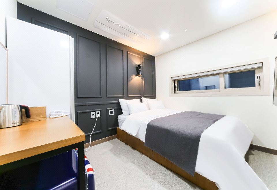 위드u 호텔&게스트하우스의 깔끔한 객실 내부 이미지