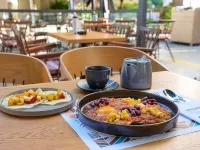 Metropole Urban Hotel - Desayuno