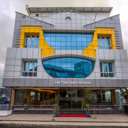 Hotel Hilltop International Отели рядом с достопримечательностью «Музей Леса и Чатем-Милл»