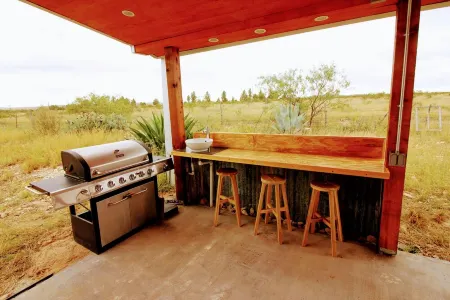 Sunset Ranch, a private acre lot facing open ranch land and high planes desert