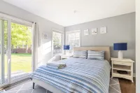 Chic Hamptons Home with Heated Gated Pool and Grill