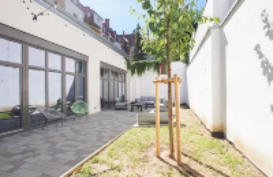 15 minutes to the old town - apartment in former industrial building