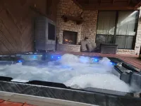 Stone House with patio, hot tub-less than 50 yards to the water.