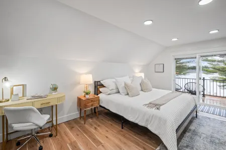 1/2 acre, 450 feet of lake frontage and a sandy beach with sunsets!