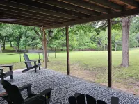 Newly Renovated 1.5 Acre Lake Front Home with Game Room and Direct Lake Access.