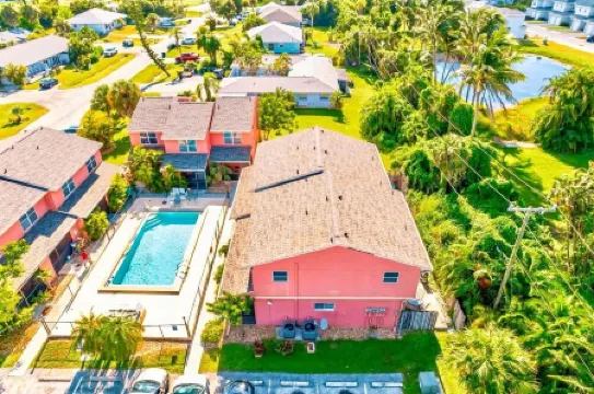 Florida Beach Hideaway – Steps from the Sand! • Pool • Fast WiFi • Free Parking
