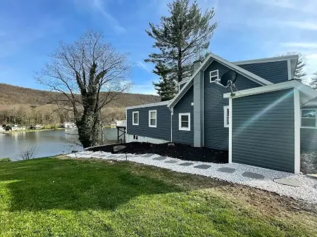 Lake Front Cottage with Fire Pit Terrace