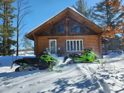 cozy lake house, full log cabin on beautiful shell lake, w/ wonderful loft.