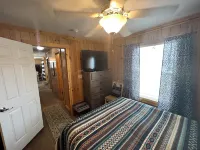 Ben Ranch Cabin # 2 located in a century old Pecan Orchard. 2 Bedroom plus couch
