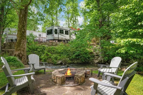 Luxurious Creekside Camper/RV in Gatlinburg, TN w/bunk room & fire pit.