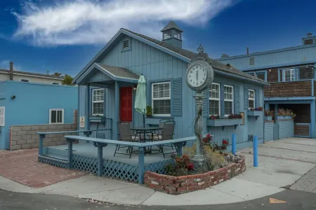 Across quiet street from sandy beach.