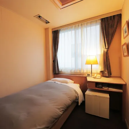 Hotel Sungarden Matsuyama Отели рядом с достопримечательностью «Храм Тайсандзи»