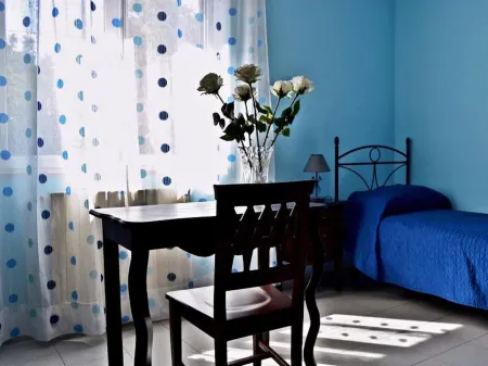 Room in B&B - Suite Rosa - B&b S. Elia Отели в г. Кальтаниссетта