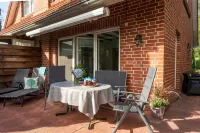A treasure chest behind the dike at the harbor for two people