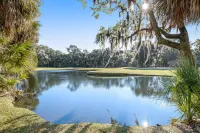 Dog-friendly beach home with screened porch, charming interior, & W/D