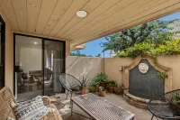 Spacious Two-Story Retreat with Garden Views - Stylish Coastal Haven