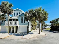 Community Pool and Distinct Living Spaces - Elegant Beach House Retreat