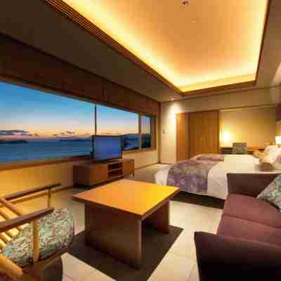 海と空と風の宿 ホテル明山荘 Rooms