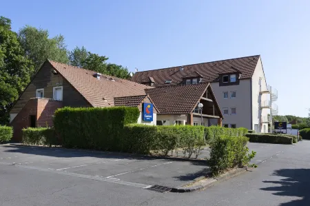 Comfort Hotel Lille Lomme Отели в г. Премеск