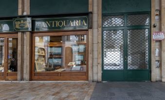 Turin Bed & Books by Wonderful Italy