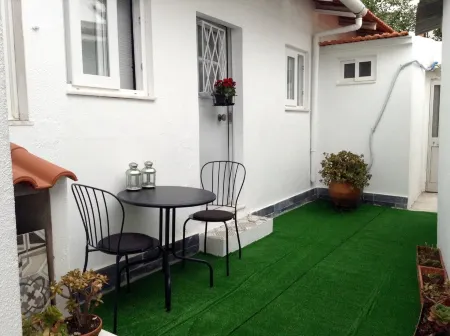 Charming Brick Wall Studio with patio in Belem Отели рядом с достопримечательностью «Ajuda Botanical Garden»