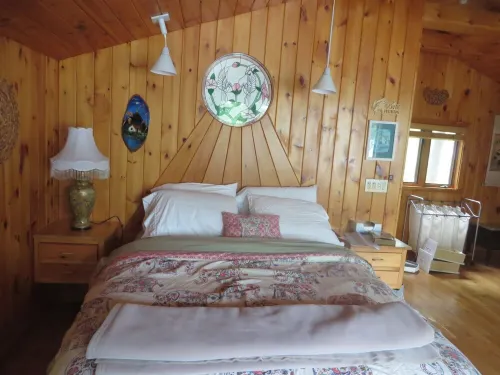 Screen Porch with see thru roof, BQ, 30' from sandy beach,  canoe and 3 kayaks
