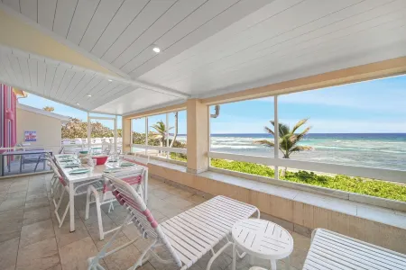 Coral Loft 4BR + 1 BR Oceanfront Villa w/ Private Pool & Beach in Grand Cayman