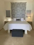 Brand New 12 Suite Villa  directly on the waters edge of the Caribbean Sea
