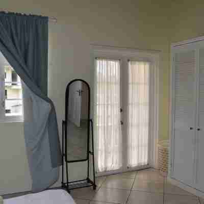 2-bedroom Gated Oasis with parking andPool Rooms