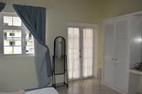 2-bedroom Gated Oasis with parking andPool