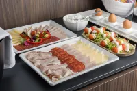 Maj Premium Residence - breakfast