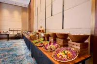 古爾岡Iris Sarovar Portico酒店 - 早餐