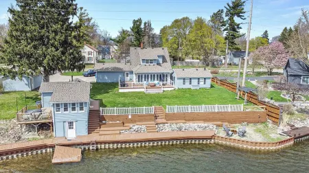 Beautiful boathouse with an all season hot tub, paddle boat and kayaks!