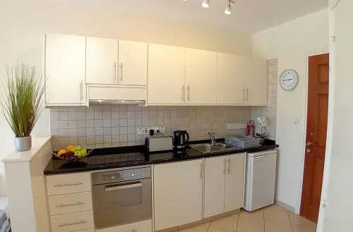 Kato Paphos Suites - GF Studio Apartment. Pool View, Wi-Fi, a/c. Great Location