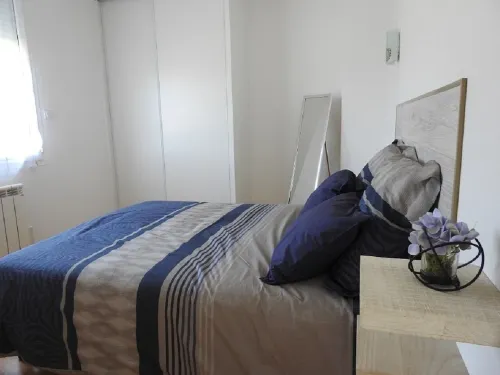 Apartment located on the ground floor of a small residence with four