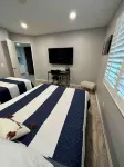 WiFi, gym, pool, spas, pet, gates, laundry, patio, walk to beach