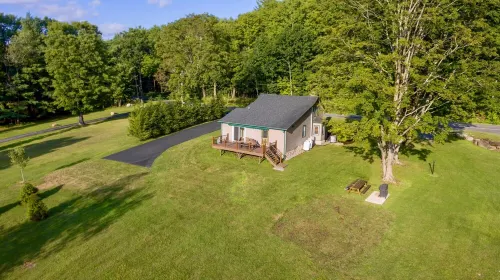 Lakeside Retreat with Guest Cottage on 5+ Acres