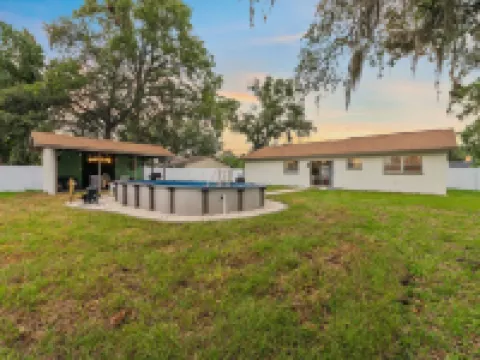 Green Modern Hideout  Pool Sleeps 12 Hotels in Spring Hill