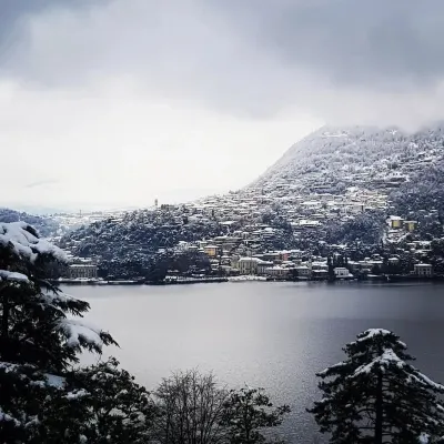 From the apartment and terrace view of the Lake, and with private parking space