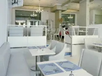 基里亞德威望佩皮尼揚中央蒙飯店 - 早餐